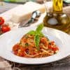 Spaghetti with vegetables and tomato sauce